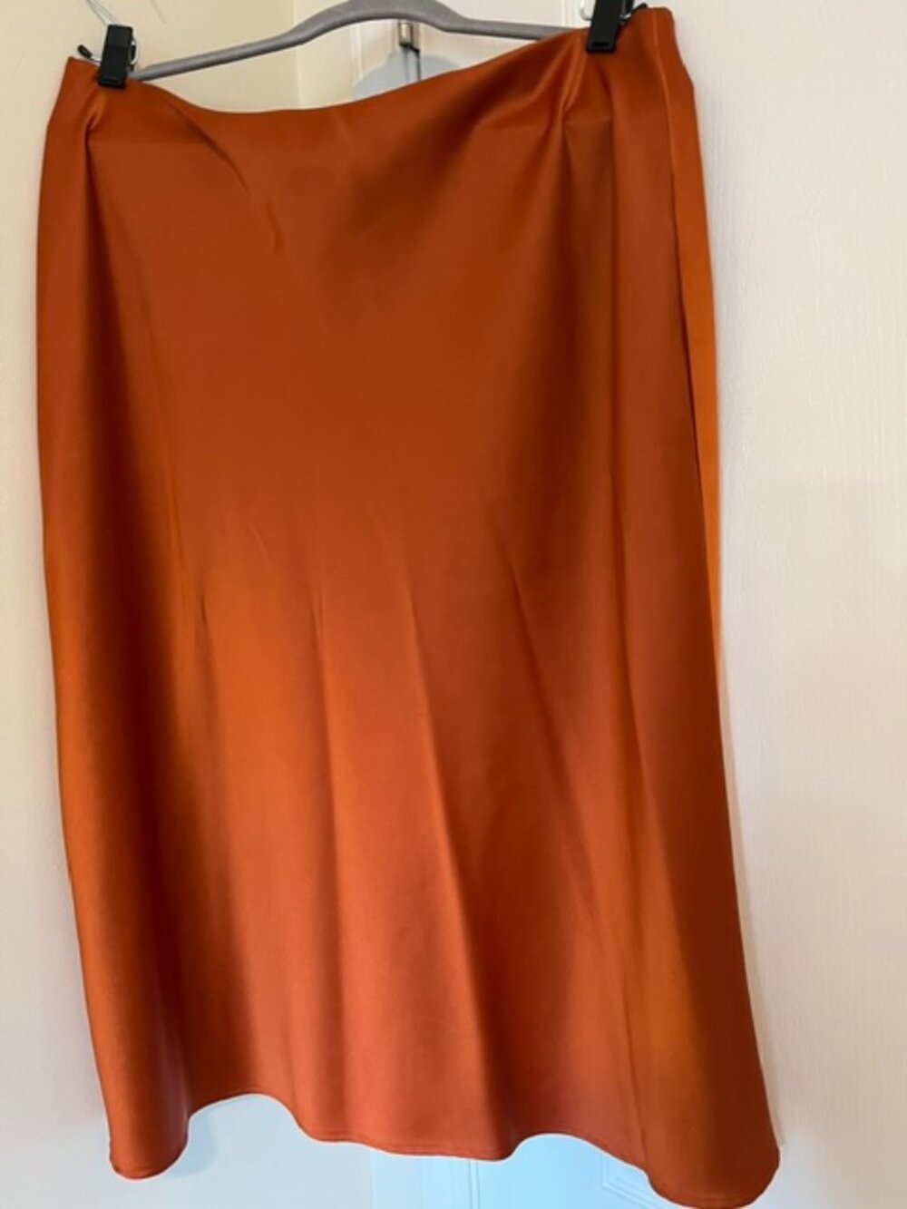 Rachael Zoe burnt orange satin midi skirt.